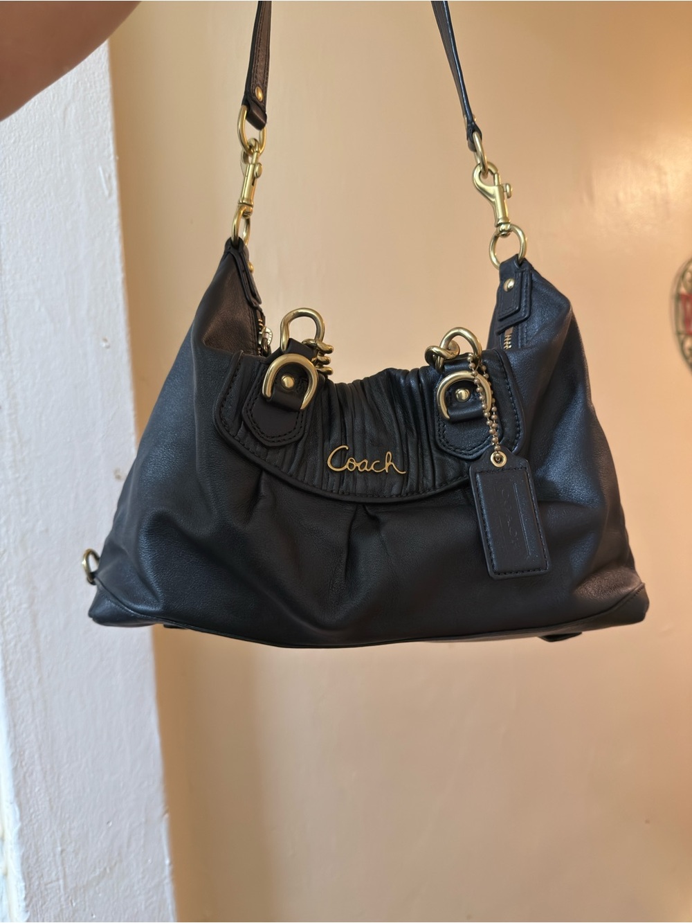 Coach Black Leather Shoulder Bag with Gold Hardware Accents